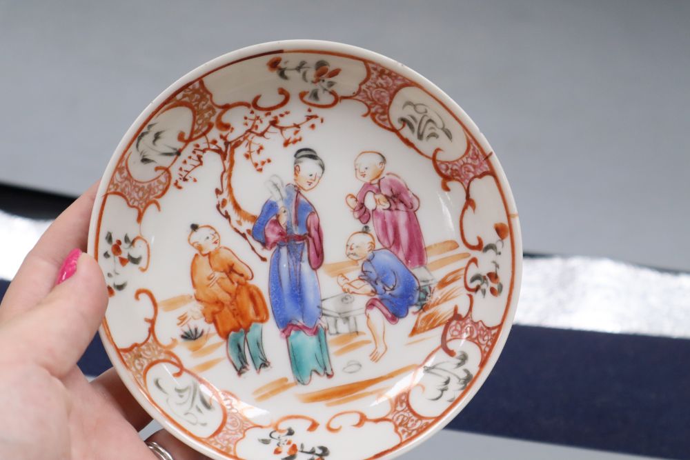 A Chinese famille rose tea bowl and saucer